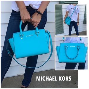Aqua Michael Kors handbag.